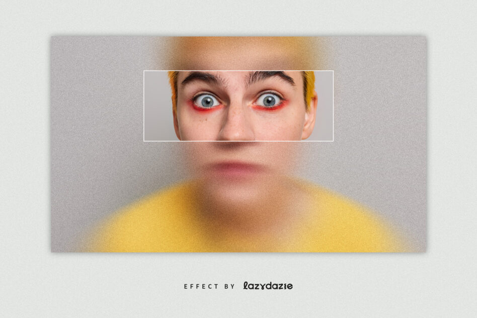 Wide-eyed portrait with red eye makeup, grainy texture overlay, yellow shirt