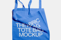 Bright blue tote bag with white text overlay showing crumpled fabric detail