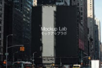 Dark Times Square billboard with Mockup Lab text centered between tall city buildings