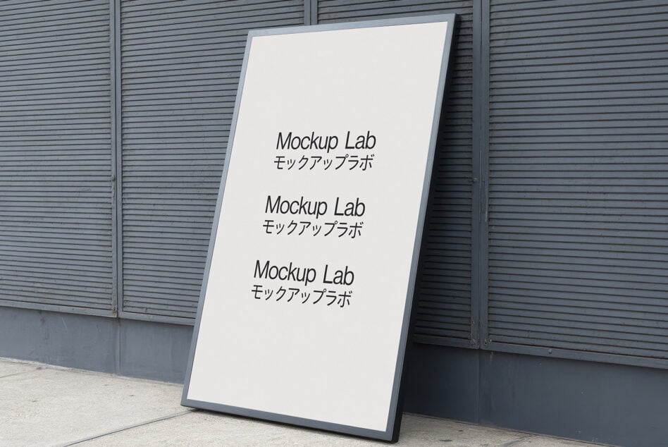 Minimalistic framed poster mockup leaning against a textured wall perfect for graphic designers showcasing artwork fonts or branding projects.