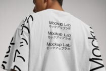 Back of white tee showing repeated Mockup Lab text in black with Japanese characters