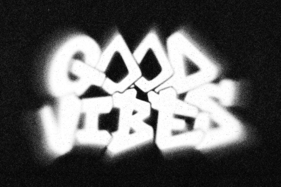 Glowing white bold letters with heavy grain texture on dark background