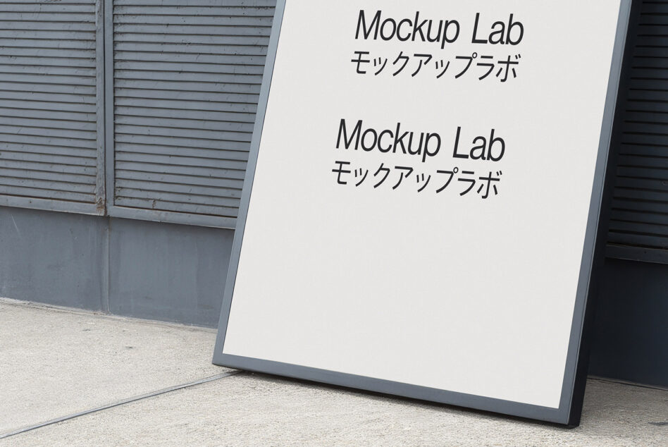 Outdoor poster mockup on sidewalk with modern typography for design presentation. Ideal for designers seeking realistic display mockups for branding.