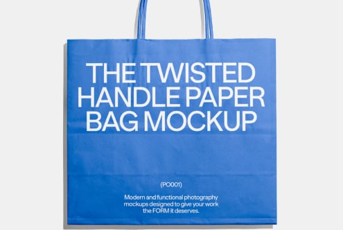 Blue twisted handle paper bag mockup featuring modern and functional design perfect for showcasing branding and packaging projects to designers.