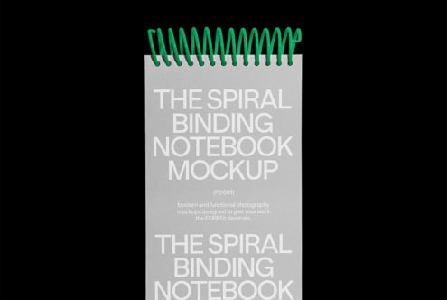 Spiral binding notebook mockup with modern design on black backdrop ideal for showcasing stationery layouts and designs perfect for graphic designers.
