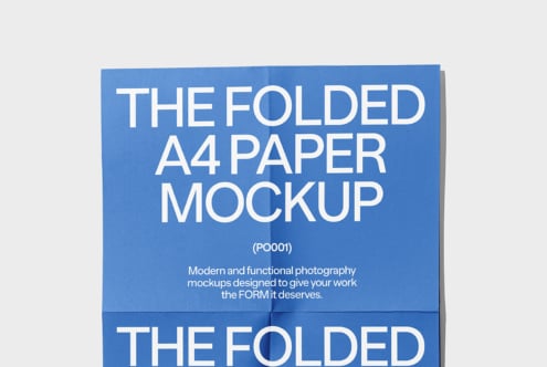 Folded A4 paper mockup in blue with white text used for modern design presentations and marketing. Ideal for designers seeking professional mockups.