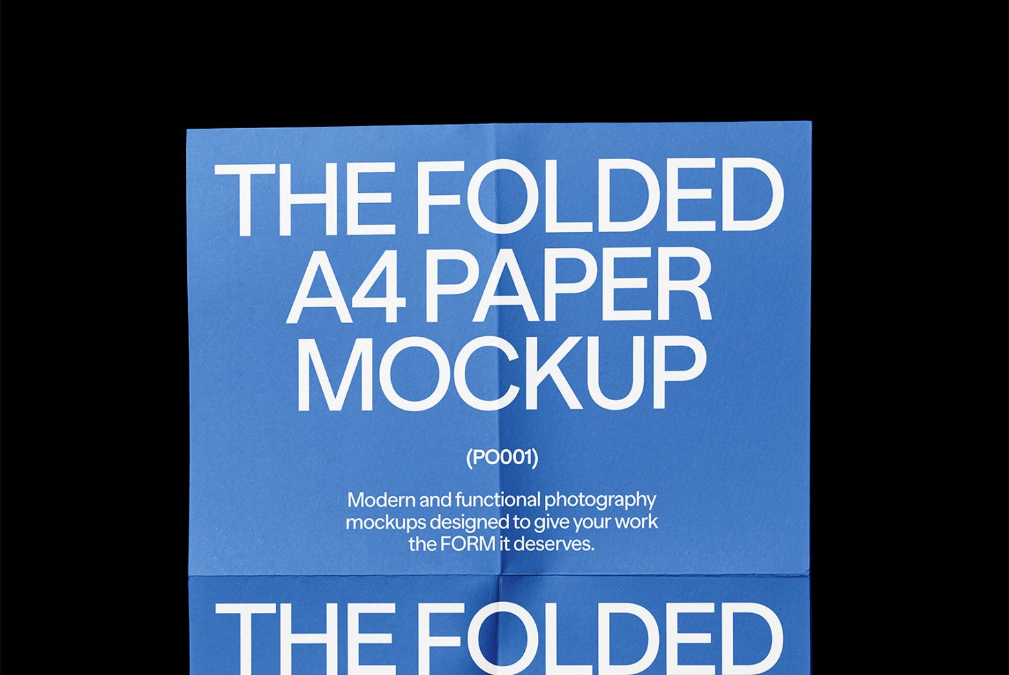 Folded A4 paper mockup in blue background. Detailed text overlay. Perfect for graphic designers and mockup templates. Ideal for showcasing designs.