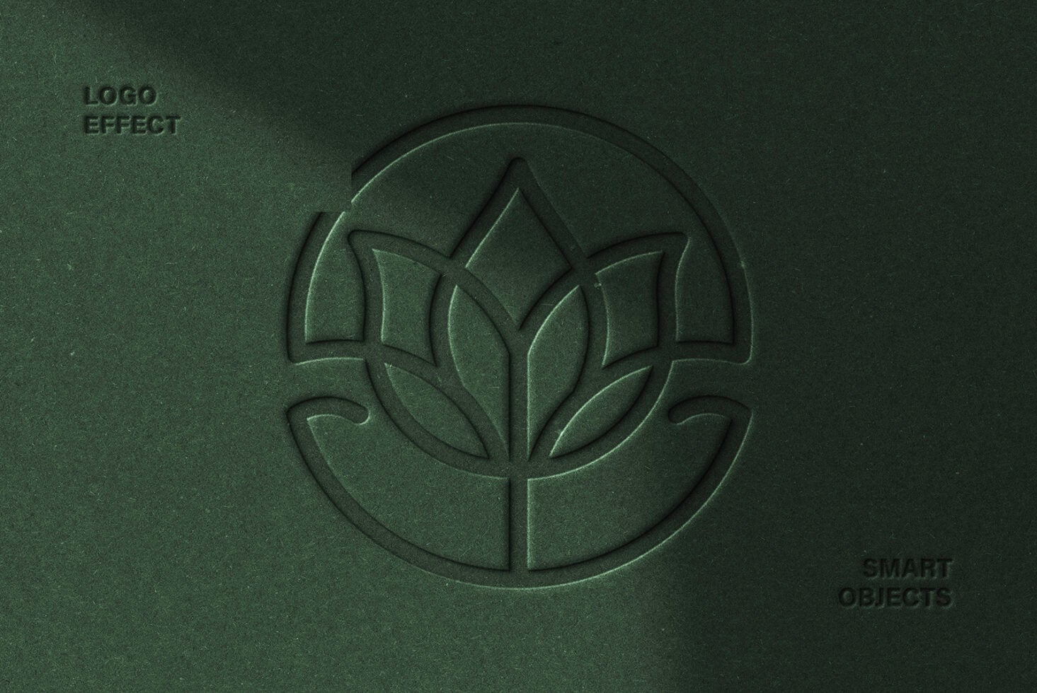 Green textured surface with embossed lotus flower logo inside circle outline