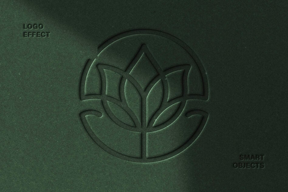Green textured surface with embossed lotus flower logo inside circle outline
