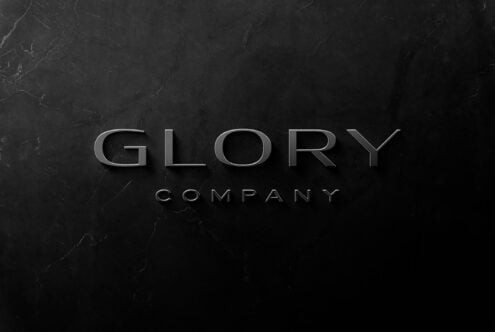 Modern 3D logo mockup featuring the word Glory on a dark marble background suitable for branding and design presentations. Ideal for graphic designers.