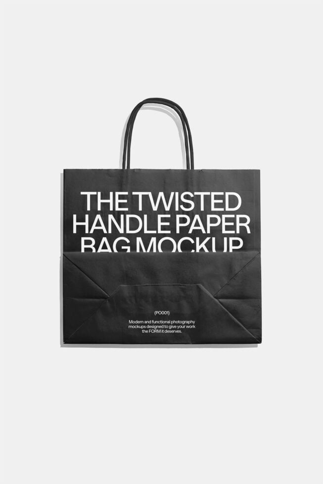 Black twisted handle paper bag mockup isolated on white background. Minimalist design for branding and packaging projects. Perfect for designers.