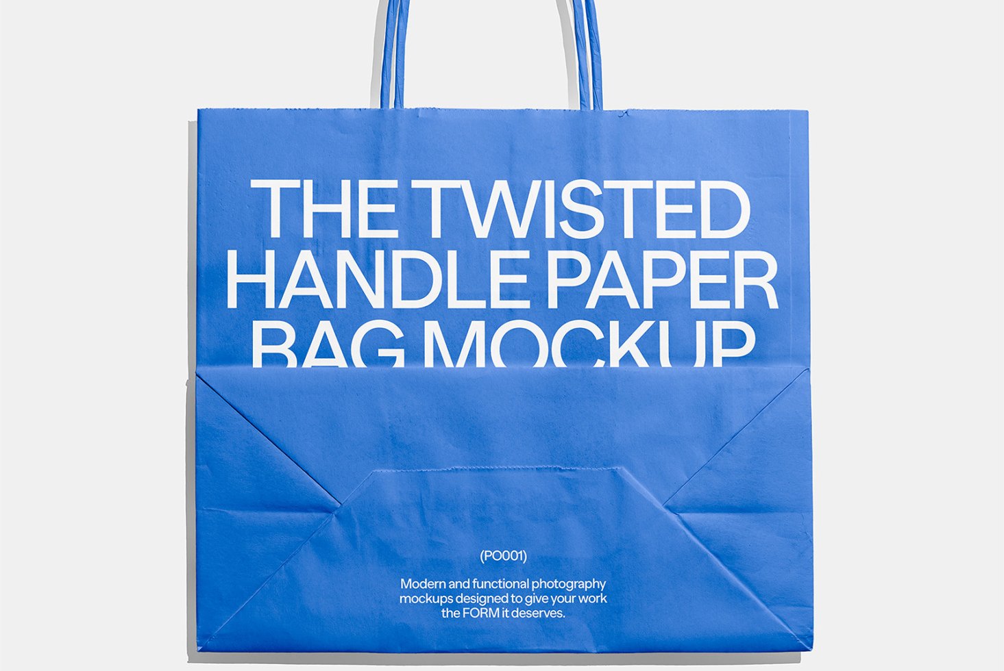 Blue paper bag mockup with twisted handles vibrant packaging design template for designers high-resolution display customizable for product presentation.