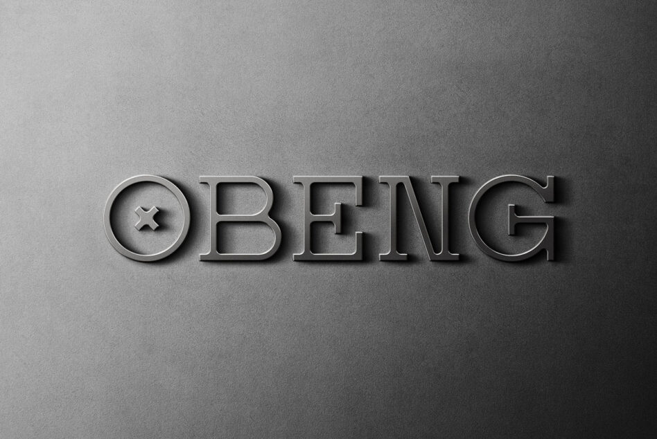 Metallic embossed text reading OBENG with star symbol on gray textured background