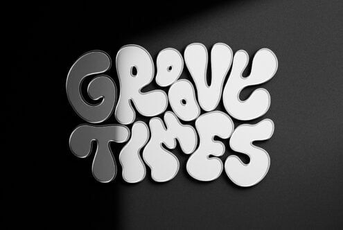 Bubbly organic 3D text saying Give Thanks in white with gray shadows on dark background