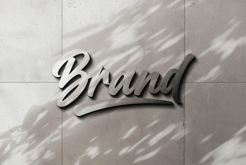 White 3D extruded script lettering casting shadows on concrete wall