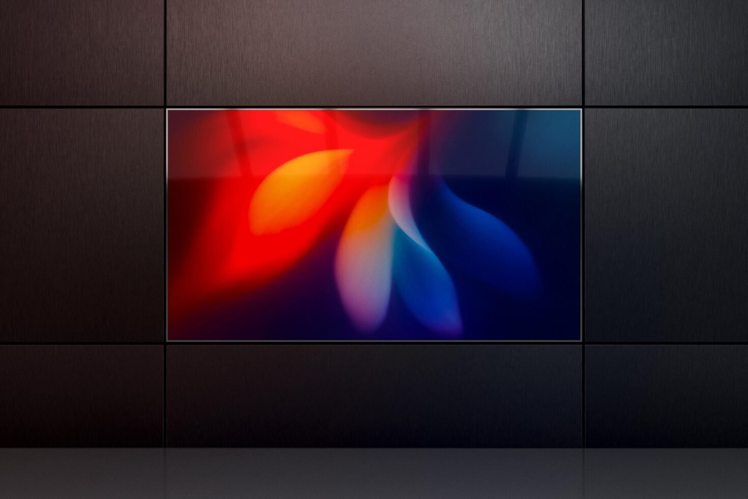 Modern digital art display with vibrant red and blue abstract design. Ideal for use in graphics and mockups. Bright colors on sleek black background.