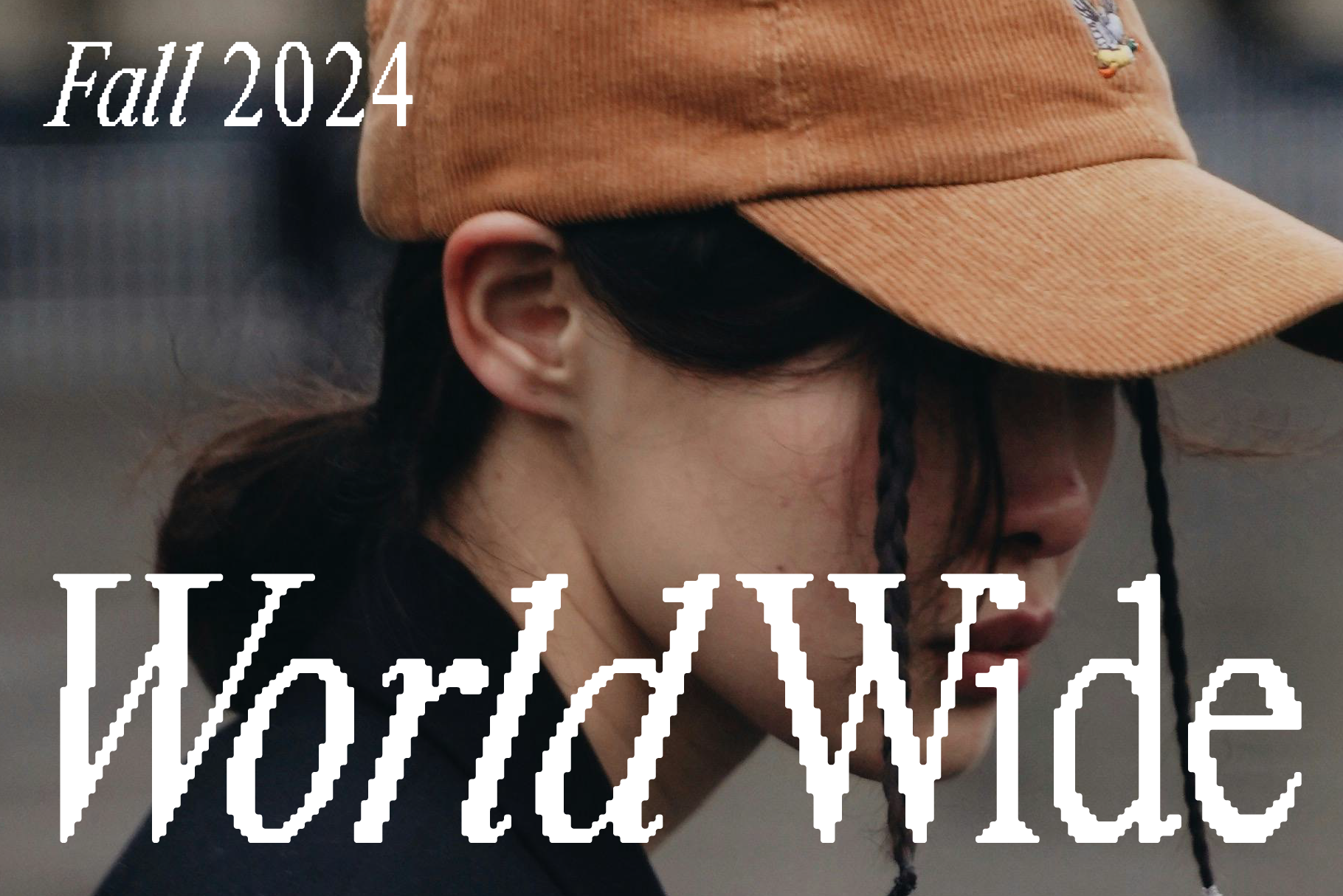 Fashionable streetwear woman in tan cap with stylish World Wide text overlay Fall 2024. Ideal for graphic design templates and layout mockups.