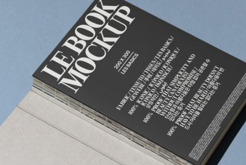 Book mockup design featuring a 200x300 size with multilingual text on a black cover, perfect for showcasing creative projects and templates for designers.