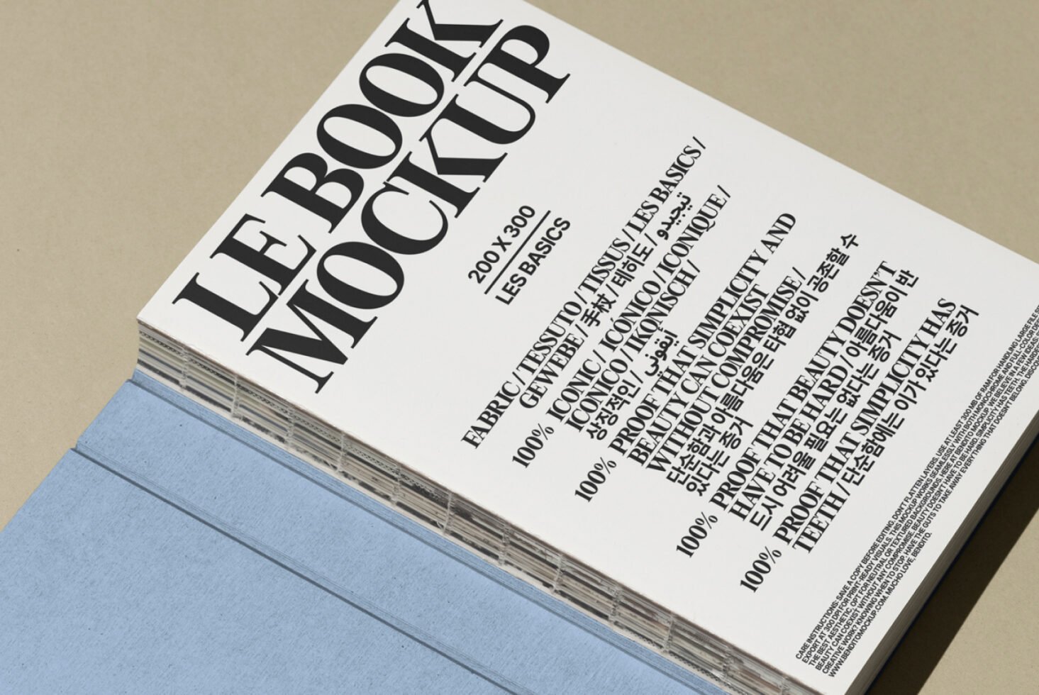 Book mockup with multilingual text on cover, featuring modern typography. Ideal for designers seeking professional print mockup templates for projects.