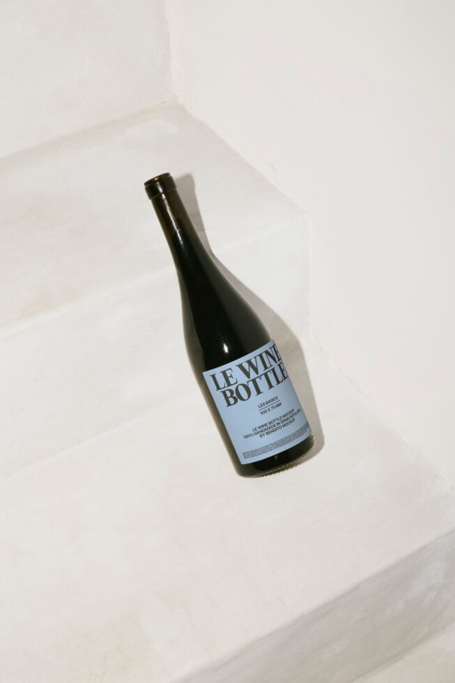 Wine bottle mockup on white step background minimalist design ideal for branding projects product presentations photorealistic template designers