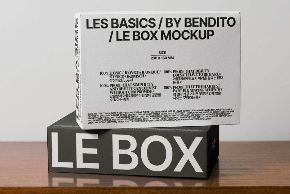 Stacked packaging showing white box on dark base in studio lighting