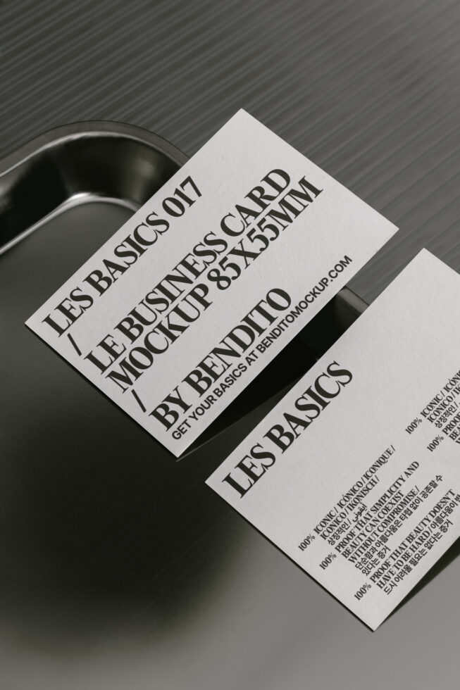 Business card mockup 85x55mm on metallic tray showcases typography. Ideal for designers seeking professional graphic templates and branding resources.