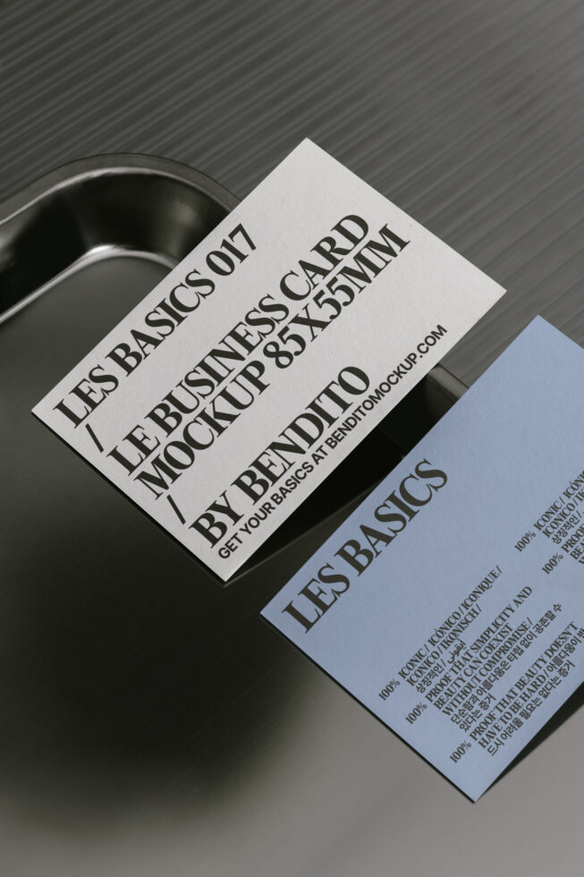 Business card mockup featuring minimalist design on metal surface ideal for designers. Keywords: business card mockup design template minimalist.