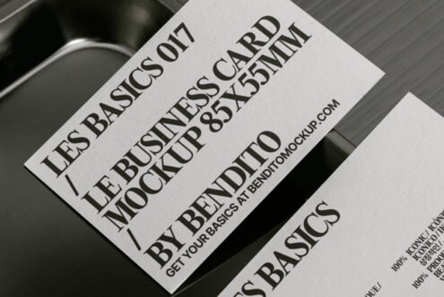 Business card mockup with bold typography on textured paper, featuring 85x55mm design by Bendito, ideal for graphic designers seeking sleek templates.