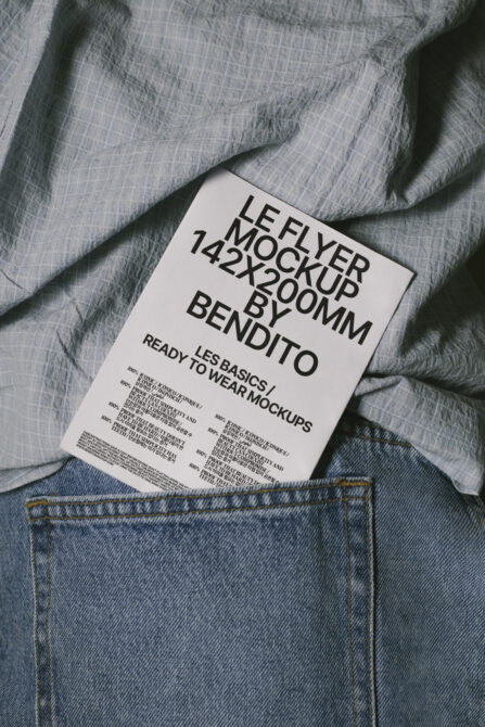 White flyer mockup 142x200mm on folded linen with denim