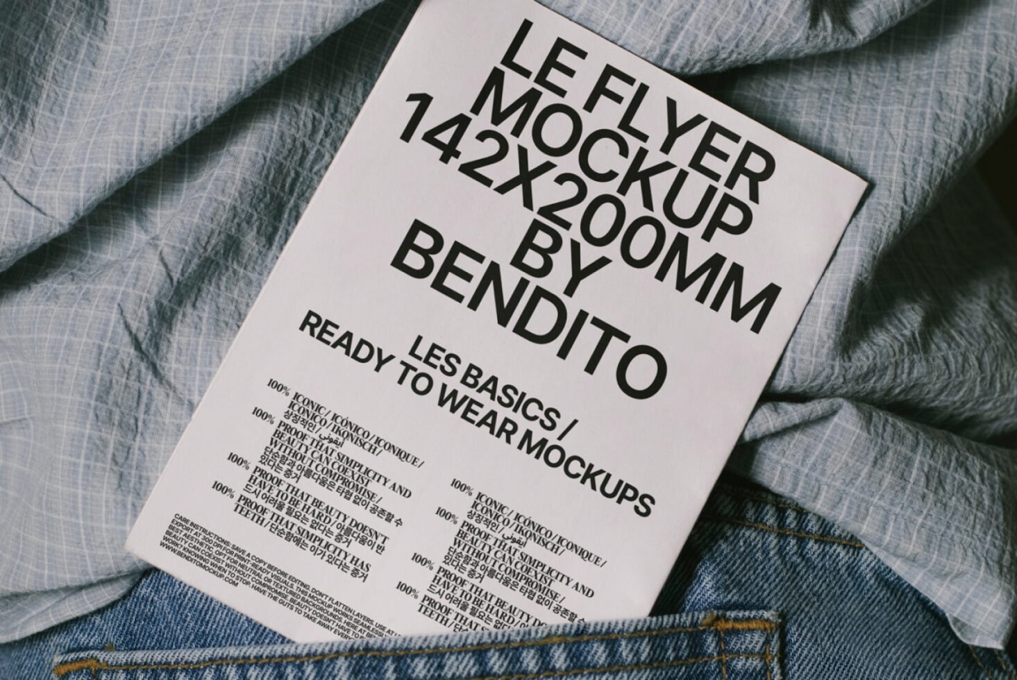 Flyer Mockup 142x200mm with bold typography on textured fabric and denim background perfect for showcasing design templates and graphics to designers.