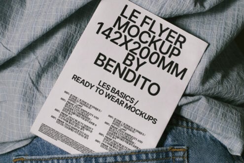 Flyer Mockup 142x200mm with bold typography on textured fabric and denim background perfect for showcasing design templates and graphics to designers.