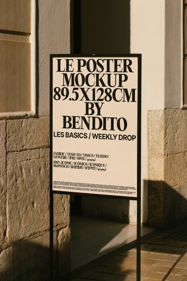 Poster mockup stand in urban setting with modern typography showcasing 89.5x128cm size ideal for designers seeking stylish presentation templates.
