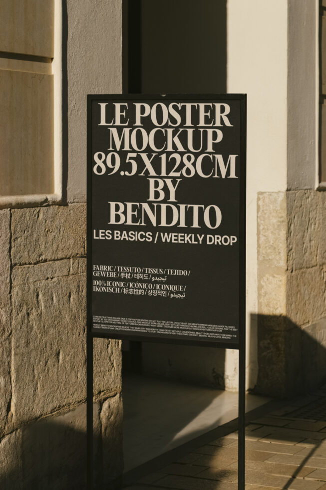 Outdoor poster mockup displayed on a black stand with textured background. Perfect for designers seeking realistic presentation templates. High-res.