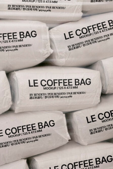 All white coffee bag mockups arranged showing branding on packaging