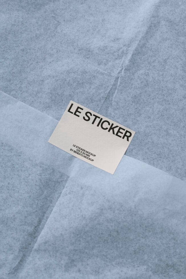 Sticker mockup on textured paper background for designers. High-quality template for showcasing branding, graphics, print design. Ideal for digital assets.
