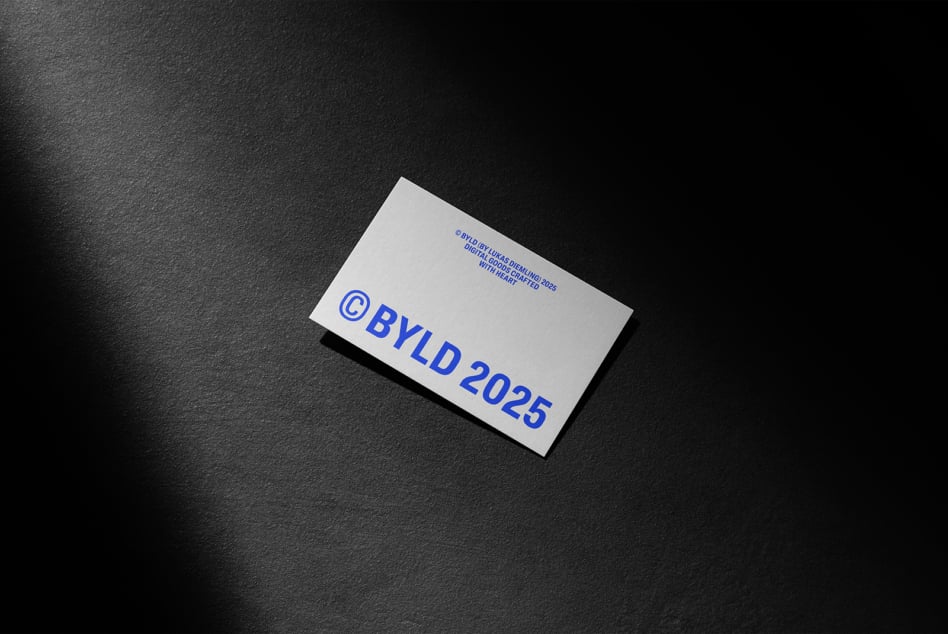 Blue text on white business card mockup tilted on dark textured background