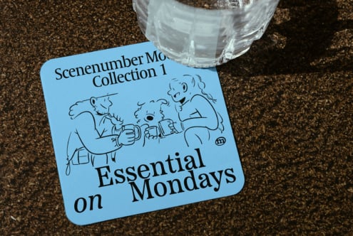 Blue illustrated coaster with cartoon characters, showcasing text about Monday essentials collection. Perfect for mockups or graphic design projects.