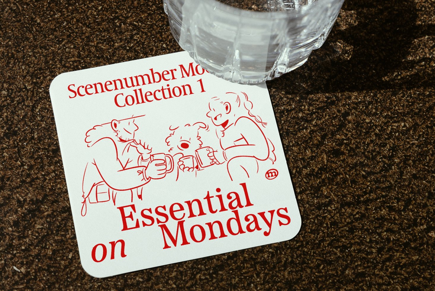 Coaster design showing cartoon characters with mugs. Red line art and text reads Essential Mondays. Suitable for mockups and graphic design assets.