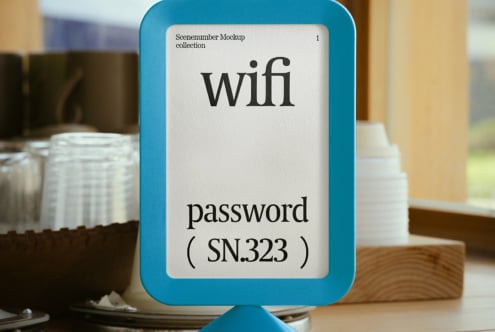 WiFi sign mockup with password in a blue frame for cafes or offices. Ideal for showcasing modern signage design. Keywords: mockup templates graphics.