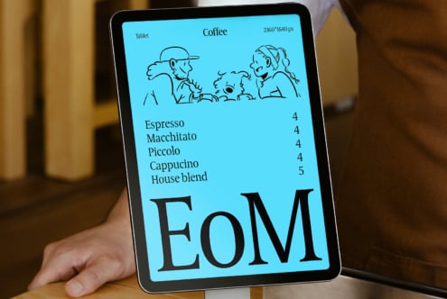 Tablet mockup held in hand displaying EoM coffee menu, blue background with illustrations