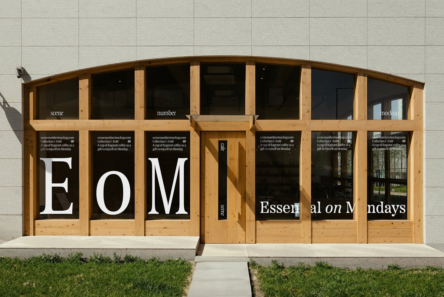 Wooden framed glass storefront displaying bold typography with the phrase Essential on Mondays. Creative storefront mockup design for visual branding templates.