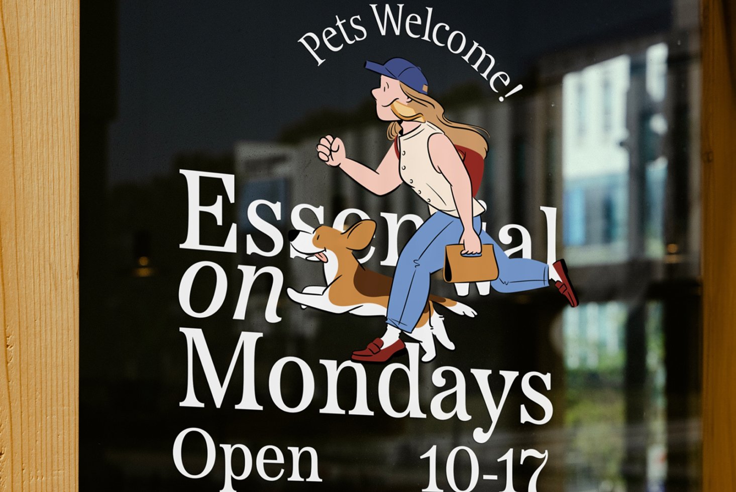 Storefront window sign with design illustration of woman and dog. Text reads Pets Welcome Open Mondays. Ideal for graphics and branding mockups.