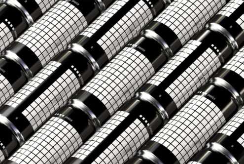 Grid patterned metallic drink cans mockup with black and white design. Ideal for packaging, branding projects. High-resolution product presentation.