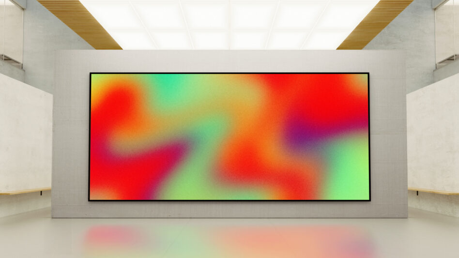 Large monitor displaying vibrant gradient colors in minimal gallery space