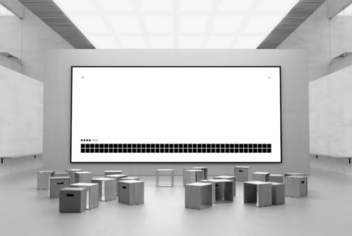 Minimalist mockup of a modern gallery space with abstract art on display cubes and large digital screen perfect for designers visualization projects.