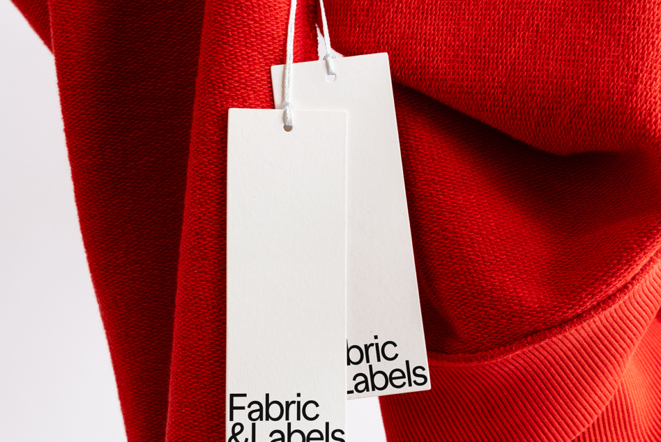 Red fabric garment with two white hang tag labels mockup stacked
