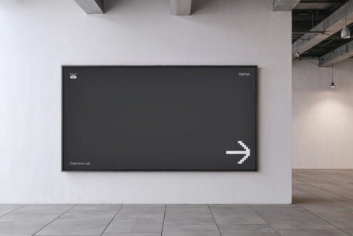 Blank black digital signage mockup in a modern interior with pixelated arrow design. Perfect for designers seeking advertising graphics templates.