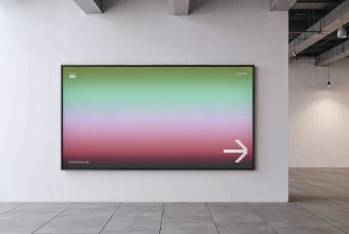 Large wall mockup with gradient display in gallery setting. Red to green gradient with pixel arrow for digital assets and template design key visuals.