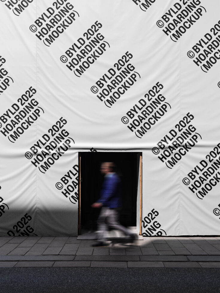 Mockup of construction hoarding with BYLD 2025 branding design. Pedestrian passes through opening. Ideal for designers seeking realistic outdoor mockups.