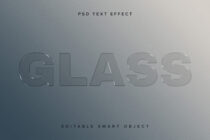 GLASS text with engraved outline style on soft blue gradient